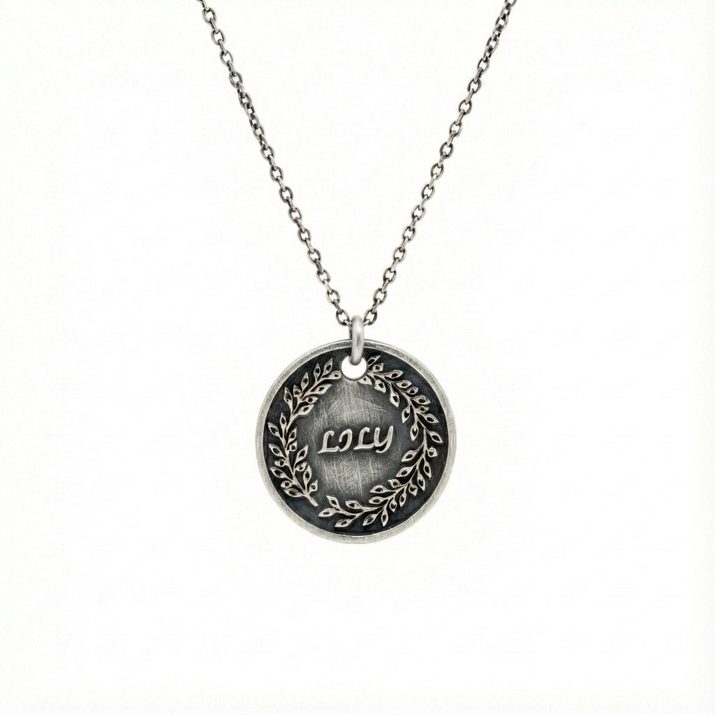 Custom Name Necklace Pendant | Hand-Stamped Sterling Silver Laurel Wreath Charm | Personal Victory Medallion, styled view
