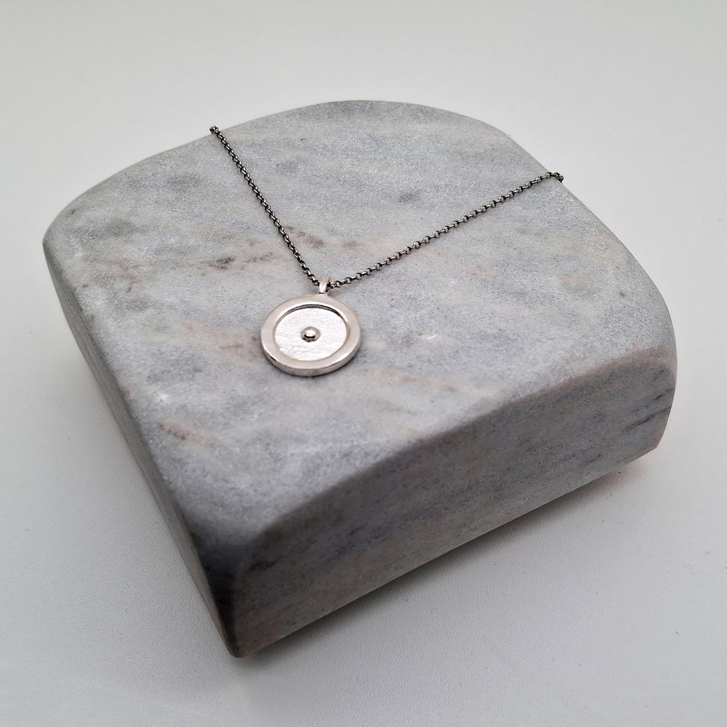 Circumpunct Sun Necklace | Small Monad Sacred Geometry Pendant Sterling Silver | Divine Spark Talisman, close-up detail